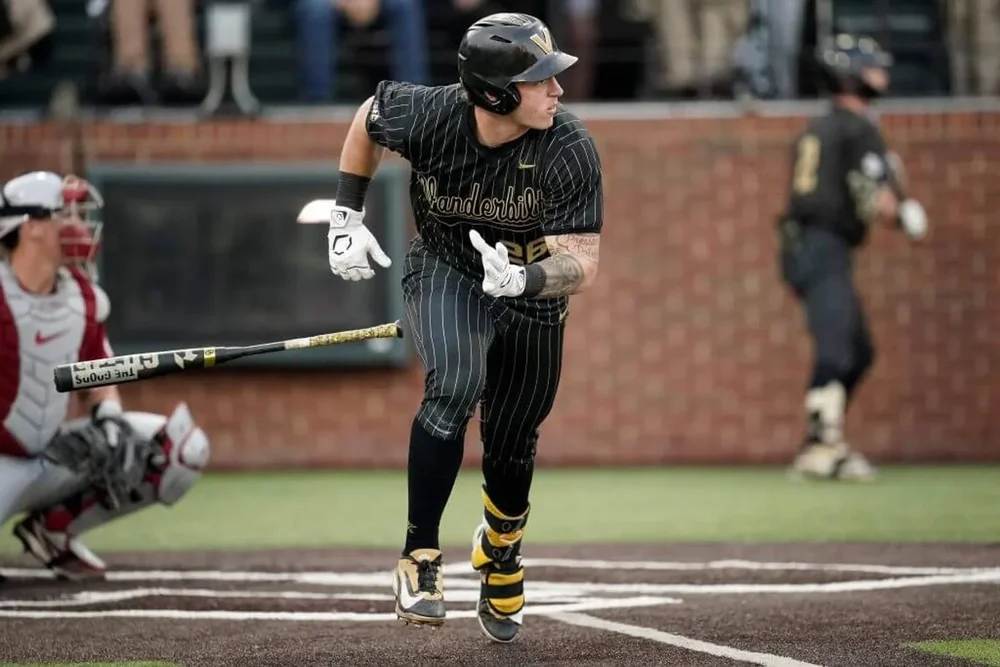 Vanderbilt left fielder Braden Holcomb hits an RBI double against Oklahoma.