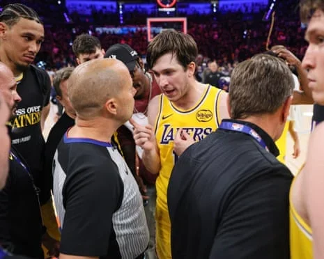 Lakers guard Austin Reaves talks with referee John Goble after their loss to the Thunder in Thursday night’s Game 2.